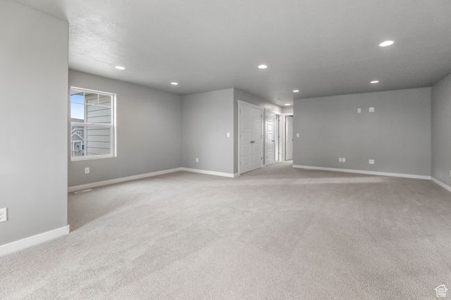 Unfurnished room featuring light colored carpet, baseboards, and recessed lighting | Image 26