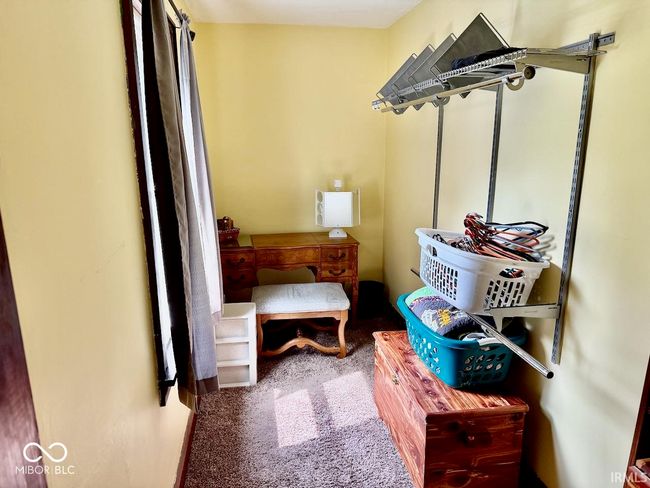 walk in closet featuring carpet floors | Image 27