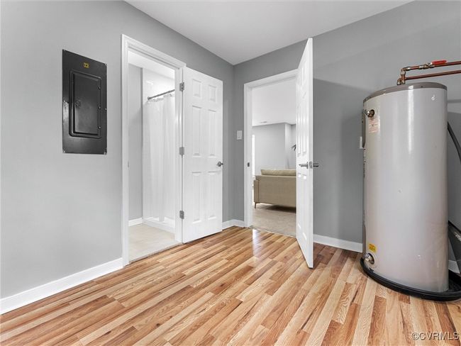 Utilities with water heater and electric panel | Image 14
