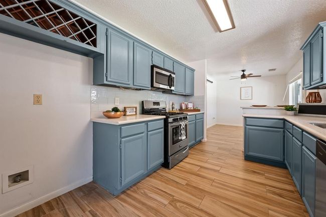Coastal blue cabinets brightening up your kitchen | Image 9