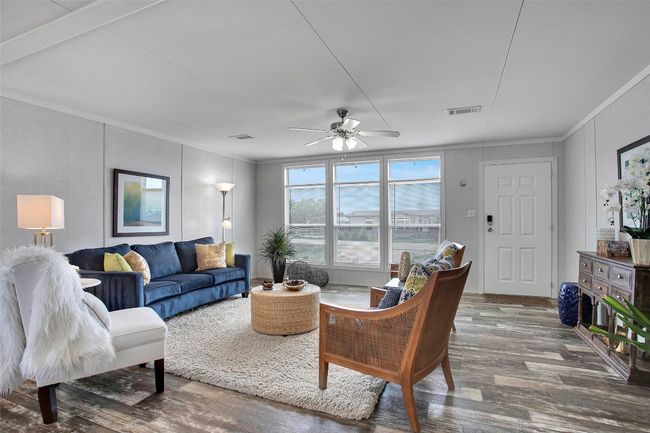 Tons of natural light in this open concept living room | Image 5