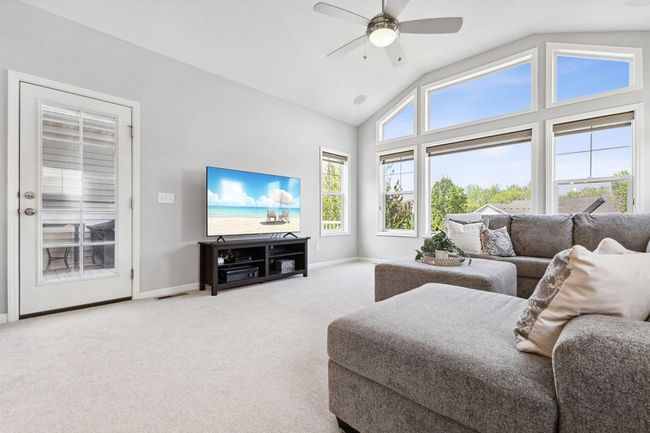 Enjoy having a maintenance-free deck just off the living room! | Image 6