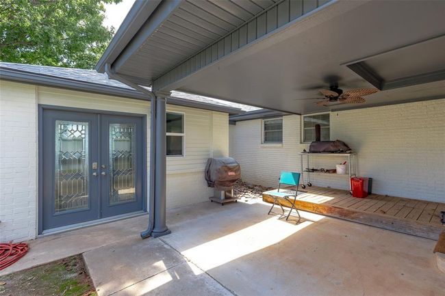 View of patio / terrace with ceiling fan, french doors, and area for grilling | Image 34