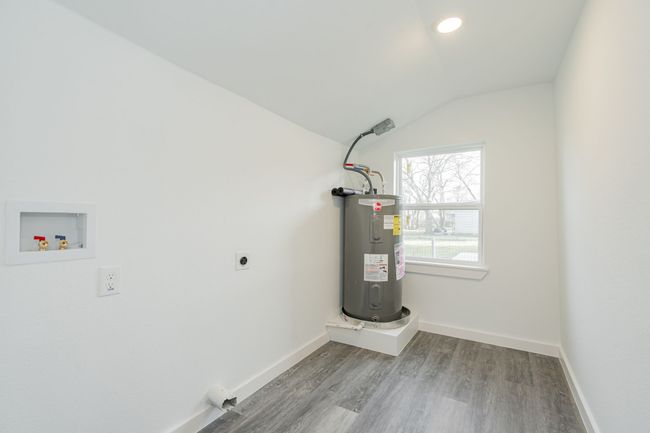 Utility room featuring water heater | Image 10