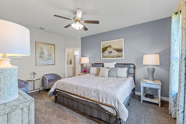 Bedroom featuring carpet, a ceiling fan, and ensuite bathroom | Image 15
