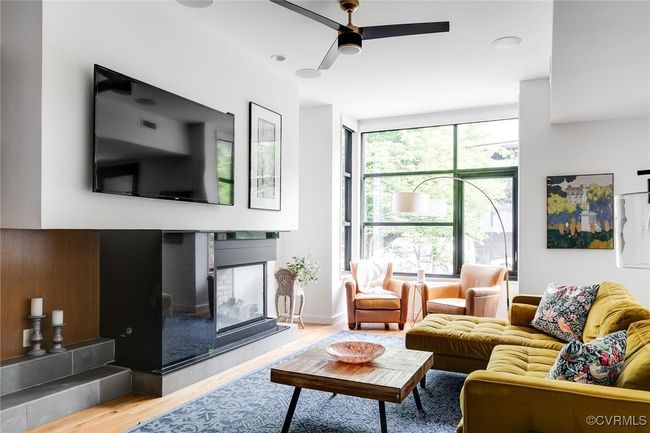 Floor to ceiling windows usher in natural light. | Image 9