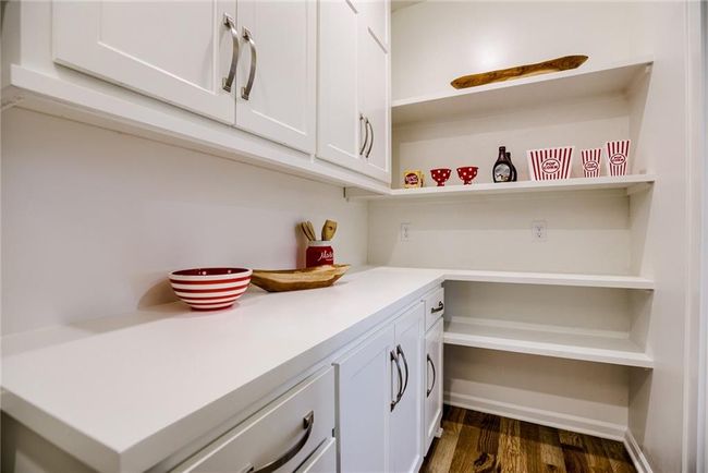 Bathroom featuring wood-type flooring and vanity | Image 19