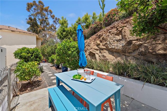 Back yard seating area with fruit trees. | Image 20