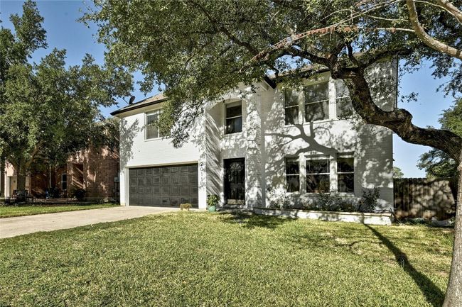 View of front of house featuring a garage and concrete driveway | Image 31
