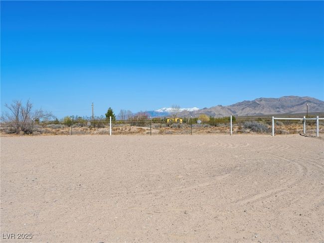 View of yard with a rural view, a mountain view, and fence | Image 67