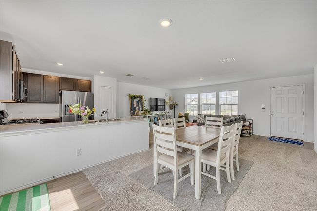 Dining room with recessed lighting and light wood-type flooring | Image 12