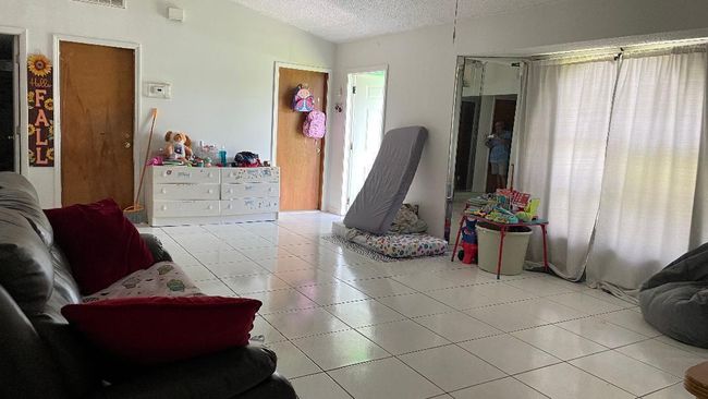 1044 Sw Canary Ter, House other with 3 bedrooms, 2 bathrooms and null parking in Port St. Lucie FL | Image 10