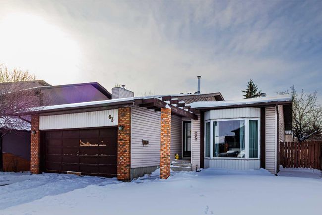 63 Castlefall Grove Ne, Home with 4 bedrooms, 2 bathrooms and 2 parking in Calgary AB | Image 1