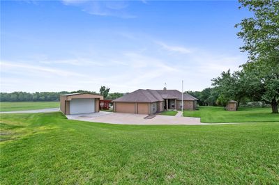 Lakefront home with a 3 car garage and a 24 x 30 shop. | Image 3