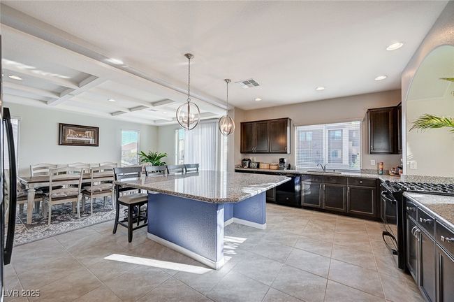 Kitchen featuring Huge Island / Breakfast Bar with Granite Countertops | Image 14