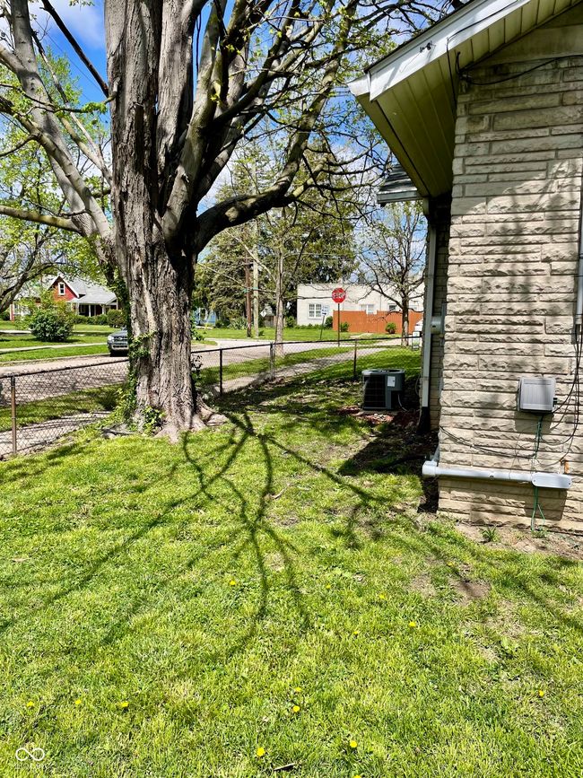 view of yard featuring cooling unit and fence | Image 26