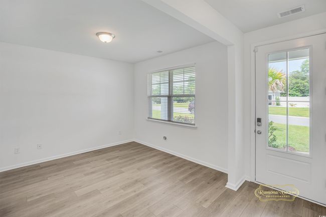 Foyer entrance featuring light wood-style flooring and baseboards | Image 7