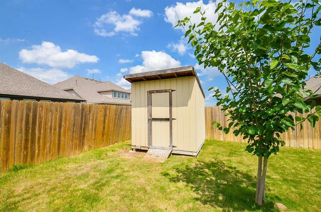What's a well tended backyard without a trusty garden shed? | Image 31