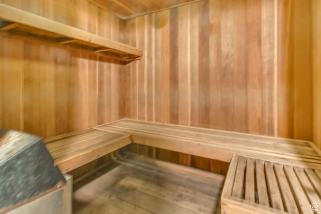 Relaxing sauna featuring wood walls | Image 33