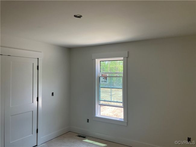 Unfurnished room featuring baseboards | Image 22