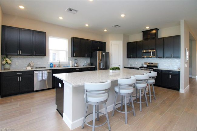 15765 Cortina St, House other with 4 bedrooms, 3 bathrooms and null parking in Naples FL | Image 5