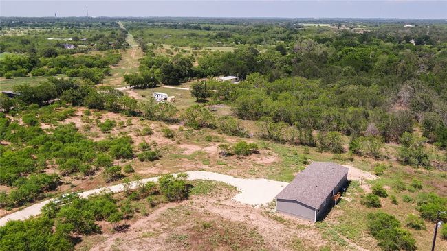 Aerial view of a heavily wooded area | Image 31