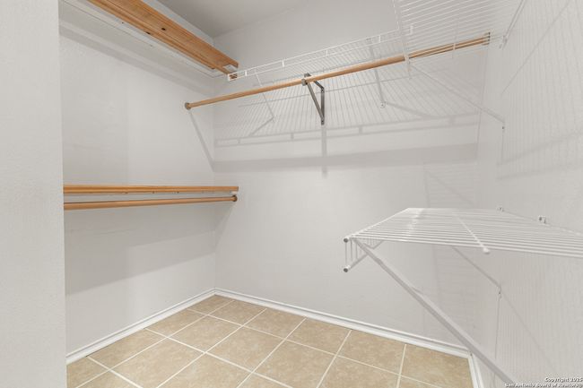 1st floor master walk-in closet. | Image 16