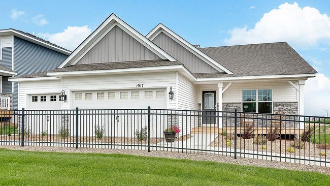 Welcome home to the Finnegan Heartland Cottage at Ravine Crossing in Cottage Grove! Photo is of model home. Options and colors may vary. Ask Sales Agent for details. | Image 41