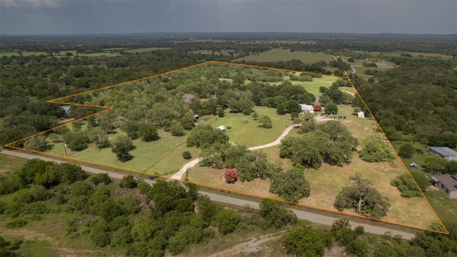 View of property location with property boundaries highlighted and a forest | Image 40