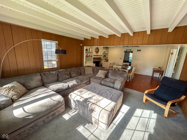 Sun room is connected to dining room offering optimal living space | Image 12