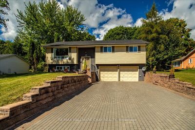 65 Meadow Heights Dr, House other with 3 bedrooms, 2 bathrooms and 8 parking in Bracebridge ON | Image 1