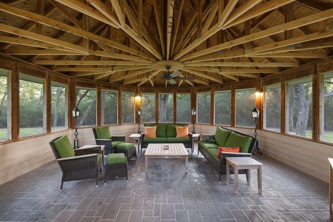 The screened in gazebo can be used year-round with its screened in windows and ceiling fan. | Image 43