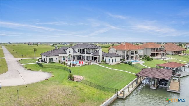 Aerial View From The Sanctuary Canal Entrance with Double Lift Boathouse, Boardwalk with Shore Power, Storage Room, Cleaning Table, and Fishing Deck | Image 40