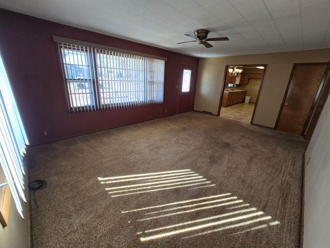 Carpeted living room | Image 8
