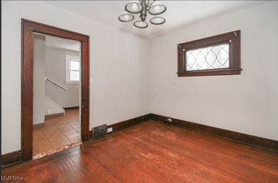 Unfurnished room featuring wood-type flooring | Image 3