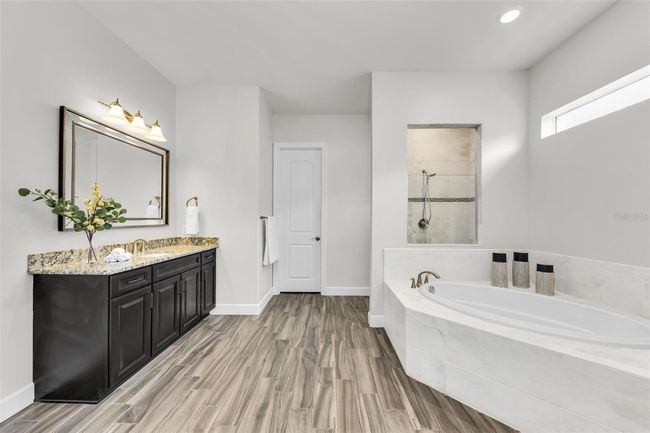 view of entrance to second walk in closet and 2nd vanity | Image 39