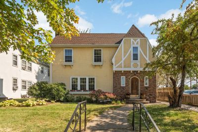 Stately classic duplex close to chain of lakes. | Image 1