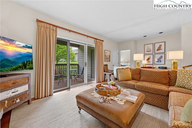Sliding doors lead to the verandah | Image 12
