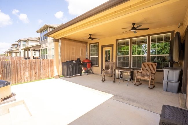 View of patio with a ceiling fan and grilling area | Image 23