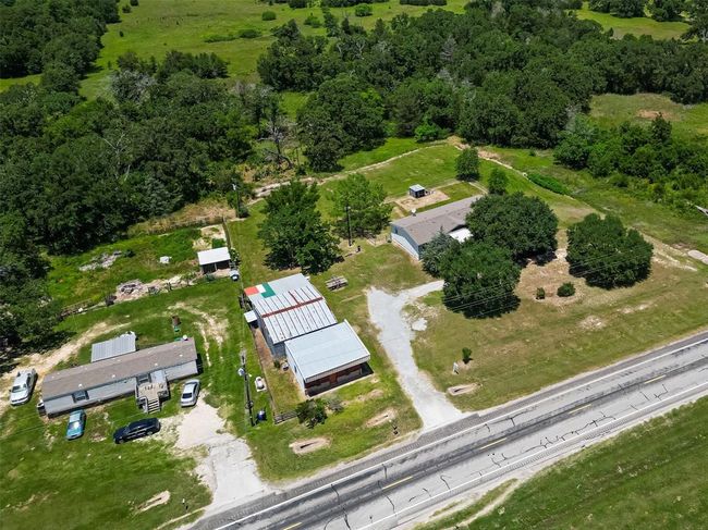 5526 Highway 90, House other with 4 bedrooms, 2 bathrooms and null parking in Madisonville TX | Image 46