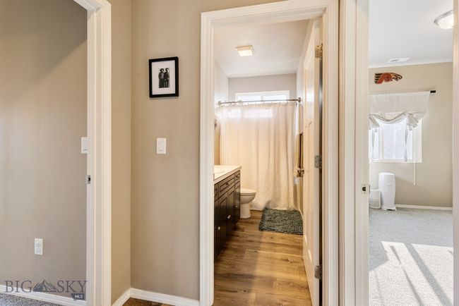 Guest bath easily accessed from living/dining/kitchen | Image 27