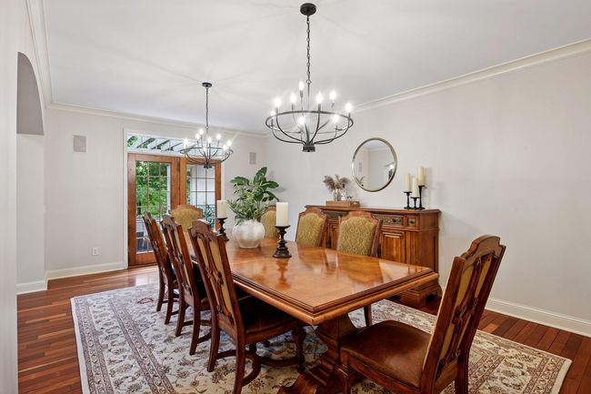 Dining room leading out to front courtyard | Image 13