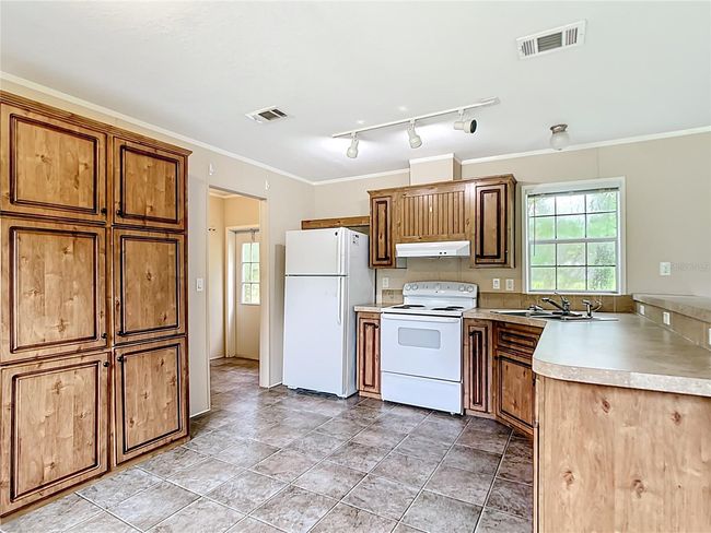 15965 Nw 44 Th Avenue Rd, House other with 2 bedrooms, 2 bathrooms and null parking in Reddick FL | Image 7