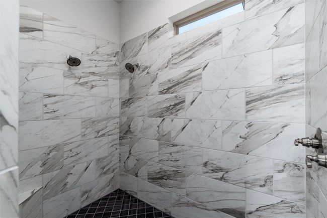Full bathroom with a tile shower | Image 18