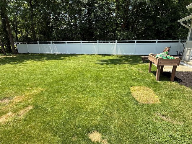 Plenty of space to relax or play in the backyard. | Image 26