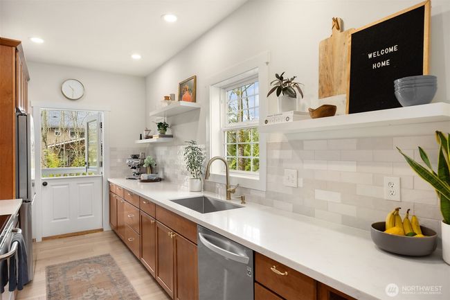 Enjoy the dutch door that looks to the back deck. | Image 13