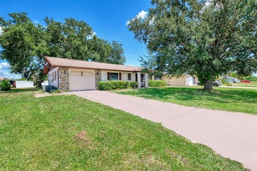 876 Linnaen Ter Nw, PORT CHARLOTTE, FL, 33948-3617 | Card Image