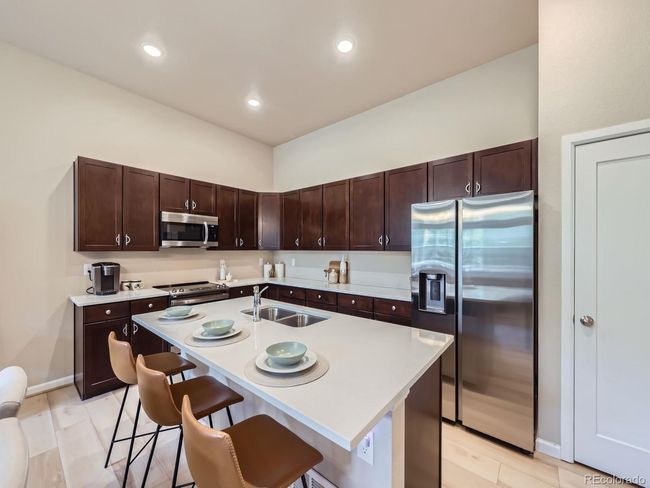 UNIT-11E - 15501 E 112 Th Ave, House attached with 3 bedrooms, 3 bathrooms and null parking in Commerce City CO | Image 11