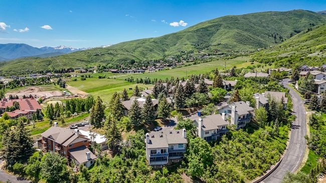 Aerial view of residential area featuring mountains | Image 30