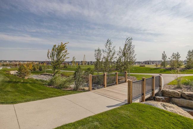 1301 Bayview Point Sw, Home with 4 bedrooms, 3 bathrooms and 4 parking in Airdrie AB | Image 37